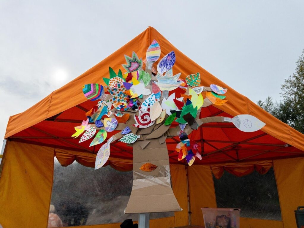 A tent covered with colorful and jeweled decorations. 
