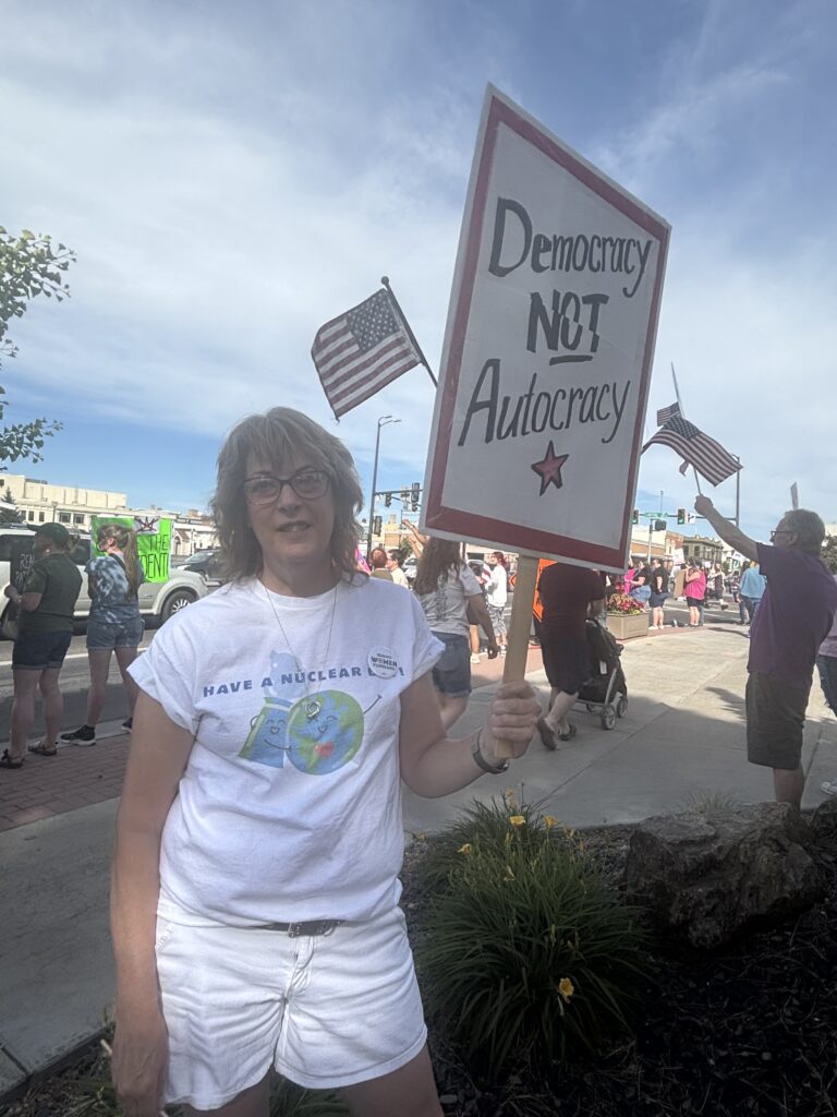 Idaho resident Kris Burnham advocating at the No Kings Rally by Gracie Leavitt