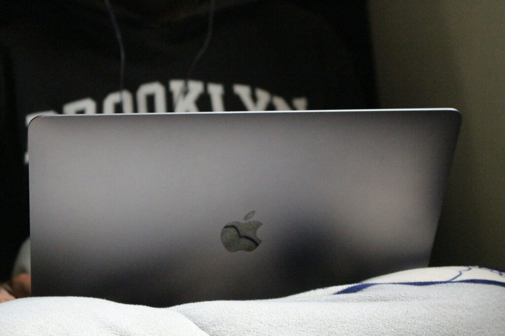 A person using a laptop.