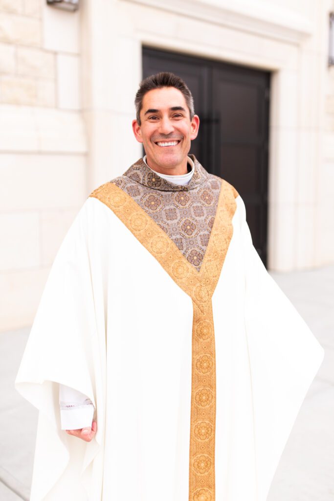 Image of Father Gale Hammerschmidt, the priest at St. Isidore’s Catholic Church, Manhattan, Kansas.