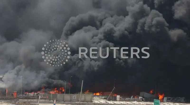 Smoke rises following an explosion at the Shahid Rajaee port in Bandar Abbas, Iran