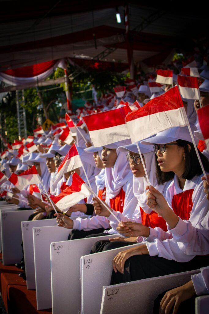 Participants display the Indonesian flag in a show of patriotism around the flag’s red and white colors. Photo By Hobi industri