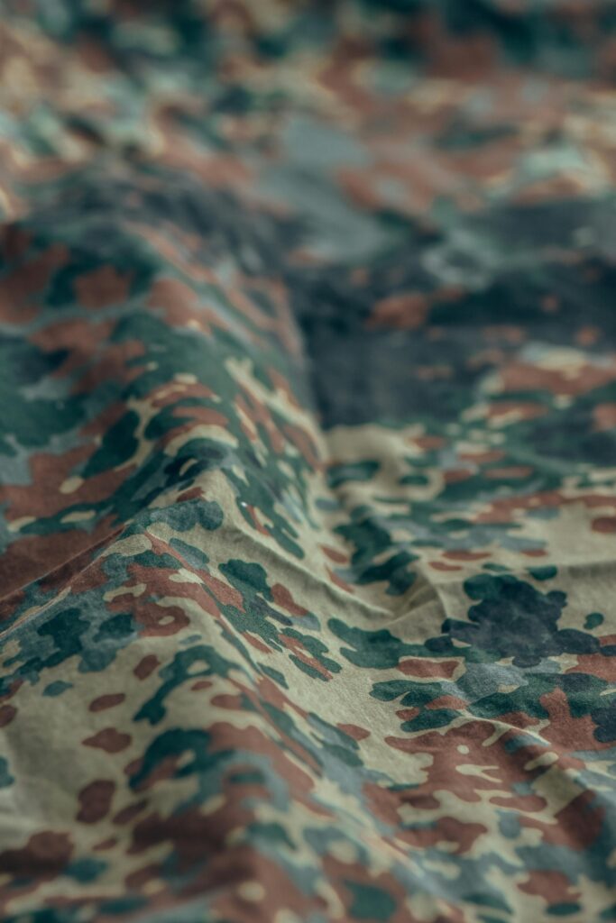 A close up of fabric with camouflage print.