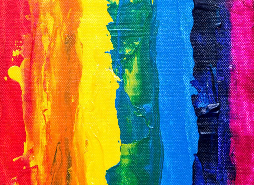 Image of paints that make for a rough rainbow