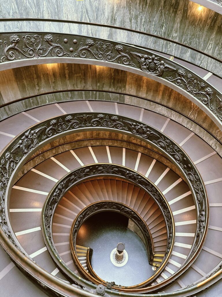 Rhythmic pattern in grand double-spiral staircase photographed in the Vatican.