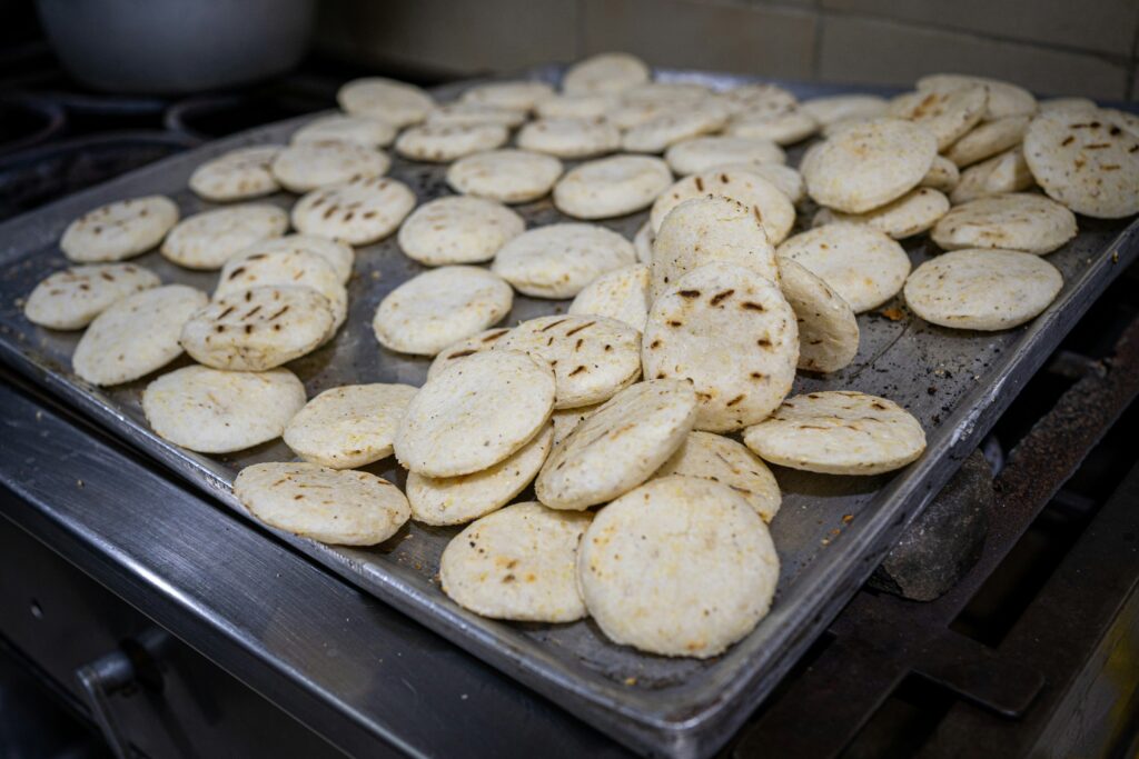A tray full of arepas. 