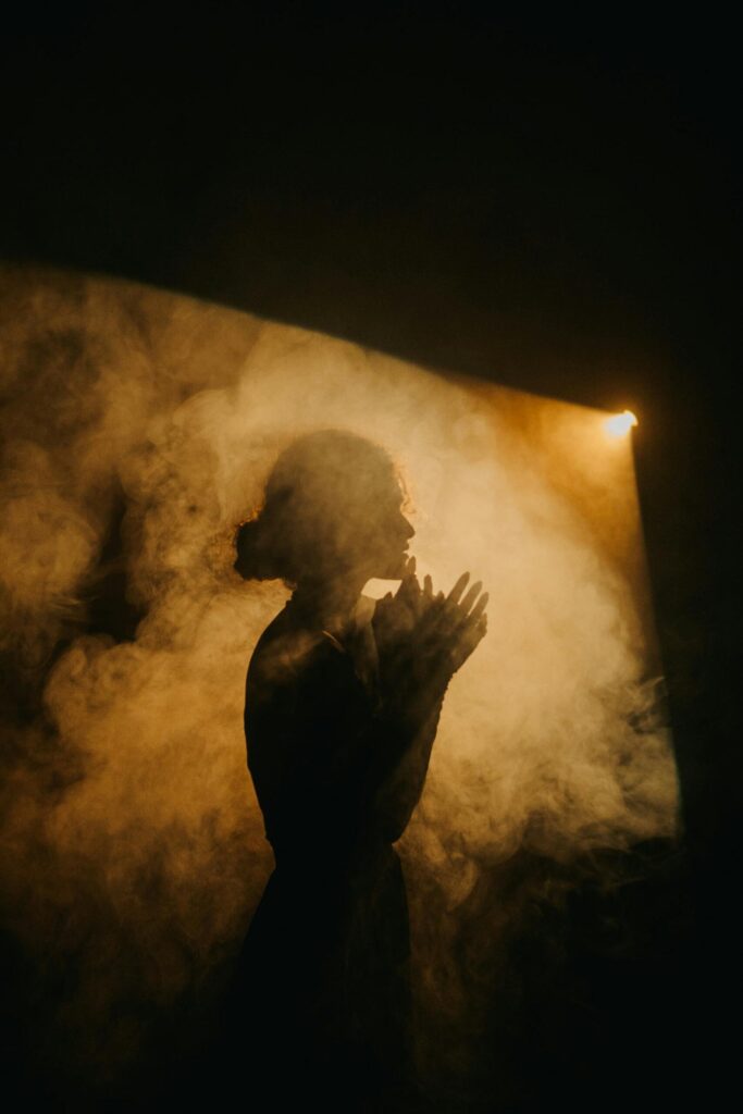 Profile of a woman in smoke. 