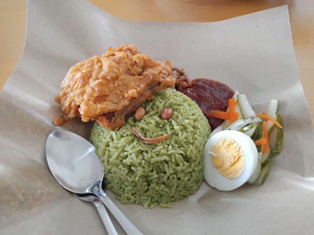 Nasi Lemak, a dish featuring rice boiled in coconut milk. Calorific