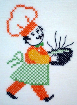 Cross-stitch chef carrying pot of hot food.